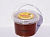 Honey in plastic containers